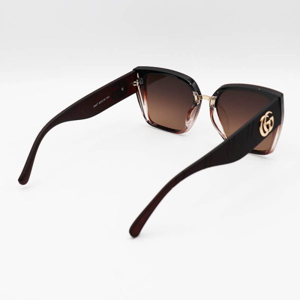 عکس از عینک آفتابی زنانه با فریم کائوچو، قهوه ای و لنز تیره گوچی مدل 8847