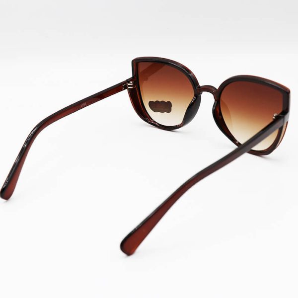 عکس از عینک آفتابی بچه‌گانه با فریم قهوه ای رنگ، شاین دار و عدسی سایه روشن مدل 3096