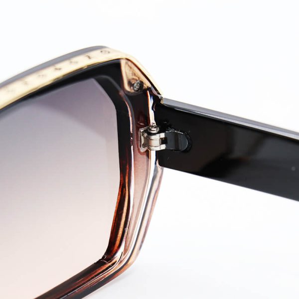 عکس از عینک آفتابی لویی ویتون با فریم چندضلعی، قهوه ای رنگ و لنز سایه روشن مدل 7262