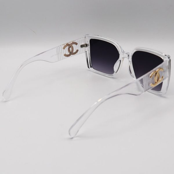 عکس از عینک آفتابی زنانه با فریم بی رنگ و شفاف، مربعی و لنز تیره شنل مدل 6929