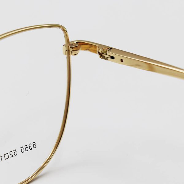 عکس از عینک طبی گربه ای با فریم فلزی، طلایی و قهوه ای رنگ برند تیفانی مدل 8355