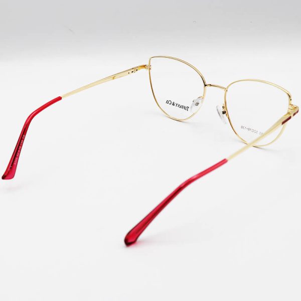 عکس از عینک طبی گربه ای با فریم فلزی، طلایی و قرمز رنگ برند tiffany & co مدل 8355