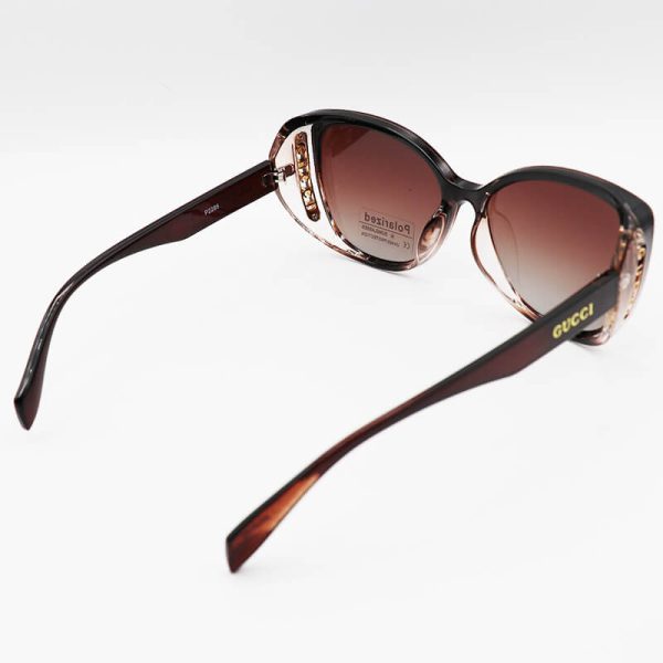 عکس از عینک آفتابی زنانه پلاریزه با فریم قهوه ای، چشم گربه ای و لنز هایلایت gucci مدل p2286
