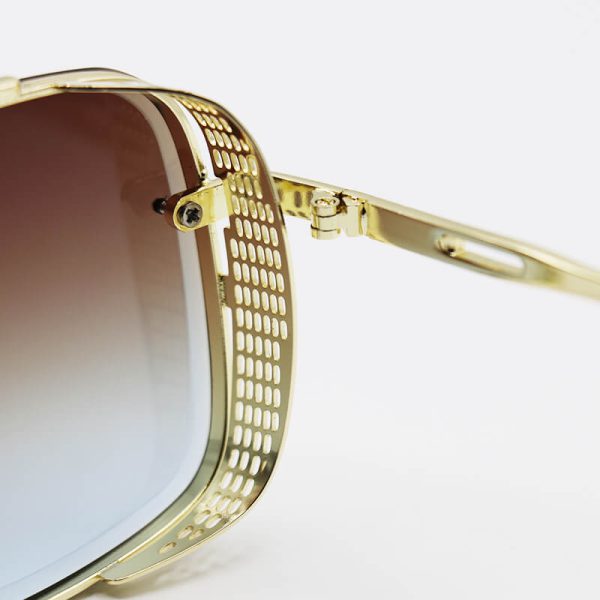 عکس از عینک آفتابی مربعی ditiai، طلایی رنگ، فریم بغل دار، لنز دو رنگ سایه روشن مدل 9703