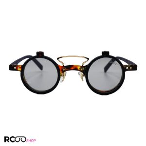 عکس از عینک آفتابی فانتزی با فریم گرد و هاوانا، دسته سرمه‌ای، کاور دار و رنگ دودی dior مدل ztc3401