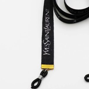 عکس از بند عینک نواری وای اس ال YSL با رنگ مشکی و از جنس پارچه‌ای مدل 992549
