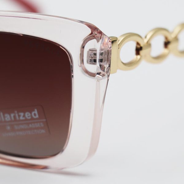 عکس از عینک آفتابی زنانه ورساچه با فریم عسلی، دسته صورتی و طلایی و لنز پلاریزه و قهوه ای مدل 3322