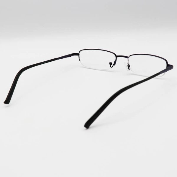 عکس از عینک مطالعه نیم فریم فلزی، مستطیلی شکل، بنفش تیره و دسته فنر دار مدل rr07