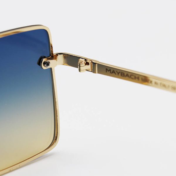 عکس از عینک آفتابی با فریم طلایی رنگ، مربعی شکل و دو رنگ هایلایت maybach مدل 22030