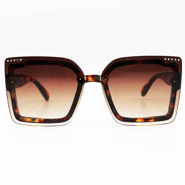 عکس از عینک آفتابی gucci زنانه با فریم هاوانا، مربعی شکل و لنز قهوه ای سایه روشن مدل 6834