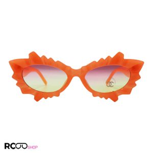 عکس از عینک آفتابی فانتزی با فریم طرح یخی، نارنجی رنگ و عدسی دو رنگ chanel مدل 9566