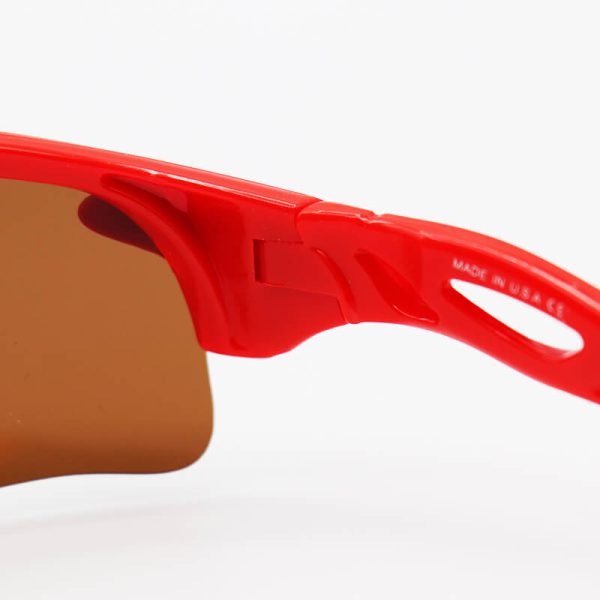 عکس از عینک ورزشی اوکلی oakley نیم فریم و قرمز رنگ با لنز قهوه ای تیره مدل 9052