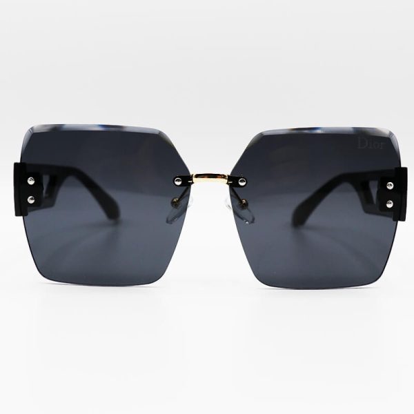 عکس از عینک آفتابی فریم لس زنانه با دسته مشکی رنگ، عدسی دودی تیره و مربعی شکل dior مدل 23041