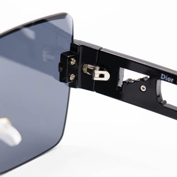 عکس از عینک آفتابی فریم لس زنانه با دسته مشکی رنگ، عدسی دودی تیره و مربعی شکل dior مدل 23041