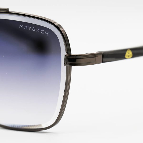 عکس از عینک آفتابی maybach با فریم فلزی، نوک مدادی، مربعی و عدسی آینه ای آبی مدل 9008
