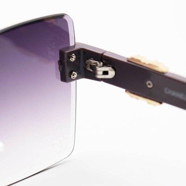 عکس از عینک آفتابی مربعی شنل با دسته خاکستری رنگ، فریم لس و لنز دودی هایلایت مدل 23051