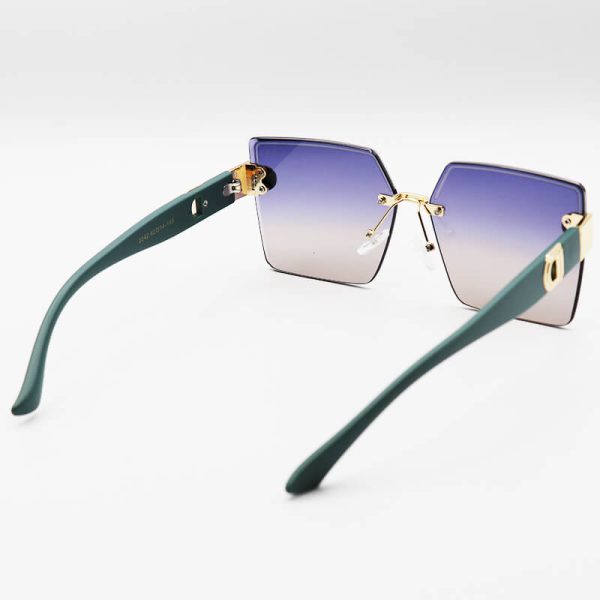 عکس از عینک آفتابی زنانه با دسته سبز، بدون فریم، مربعی شکل و لنز دو رنگ dior مدل 2242