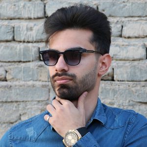 عکس از عینک آفتابی مربعی کوچک با عدسی یووی 400 Gentle Monster مدل 1764 بر روی صورت محمدحسین ابراهیم زاده