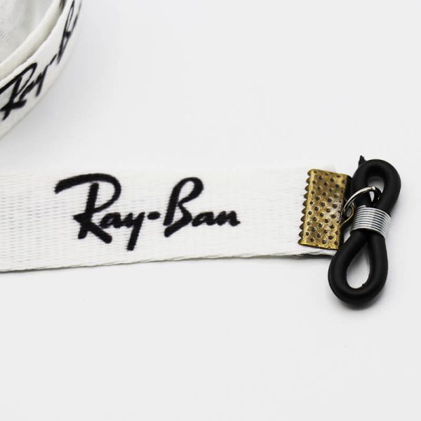 عکس از بند عینک نواری ریبن ray-ban با رنگ سفید و از جنس پارچه‌ای مدل 992536