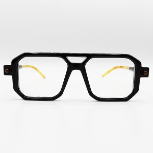 عکس از عینک طبی نقطه ای مشکی رنگ، مربعی شکل، دسته مدادی و لوله ای MARC JACOBS مدل 8709