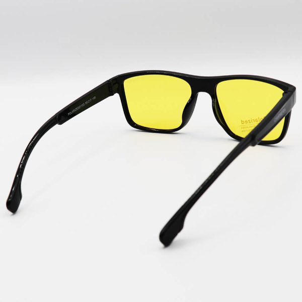 عکس از عینک دید در شب پلاریزه کاررا با فریم مربعی شکل، مشکی براق و عدسی زرد رنگ مدل 21103