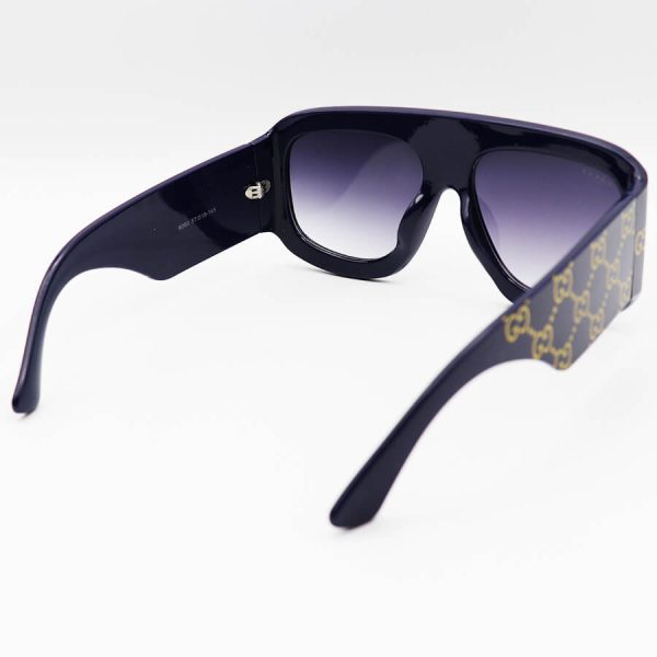 عکس از عینک آفتابی فانتزی با فریم سرمه ای رنگ، مربعی شکل، دسته پهن و لنز دودی هایلایت گوچی مدل 6009