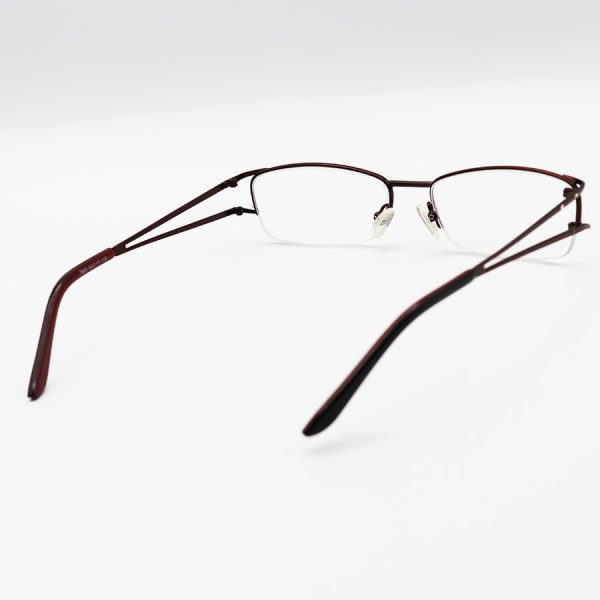 عکس از عینک مطالعه نیم فریم با فریم قهوه ای رنگ، ازجنس فلزی و مستطیلی شکل مدل 7800
