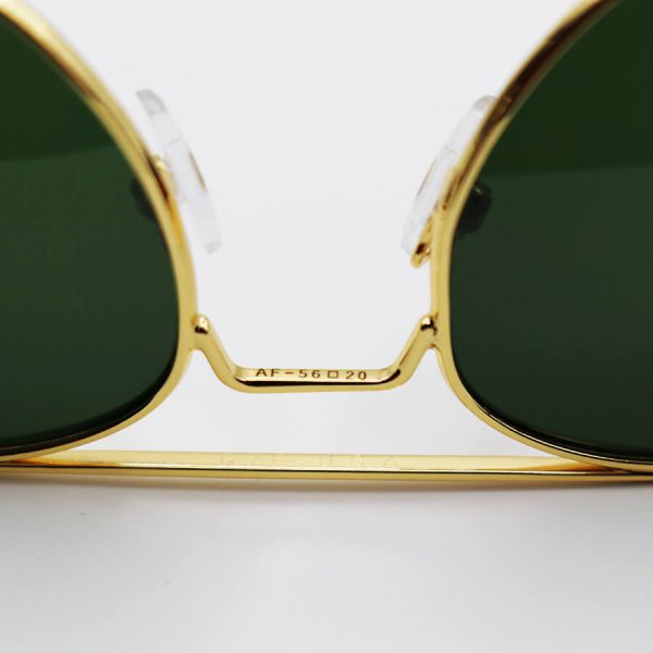 عکس از عینک آفتابی کلاسیک با فریم طلایی رنگ، لنز شیشه ای و رنگ سبز تیره برند راندولف مدل s56