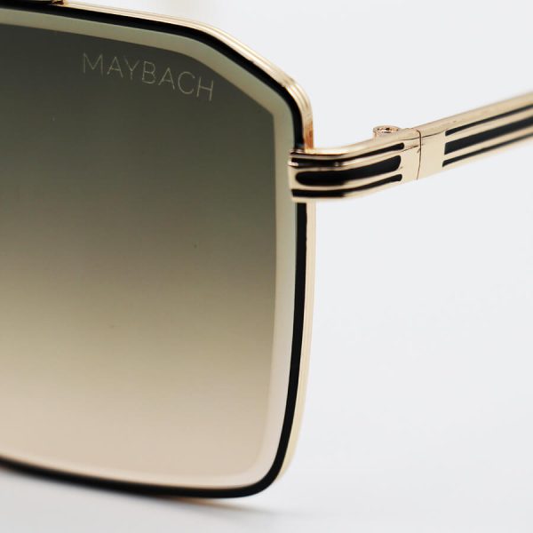 عکس از عینک آفتابی لاکچری با فریم طلایی، چند ضلعی و لنز قهوه ای سایه روشن maybach مدل 22402