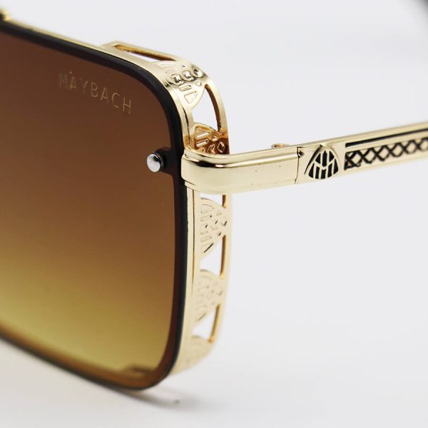 عکس از عینک آفتابی میباخ با فریم مستطیلی شکل، طلایی رنگ و عدسی قهوه ای سایه روشن مدل 5202