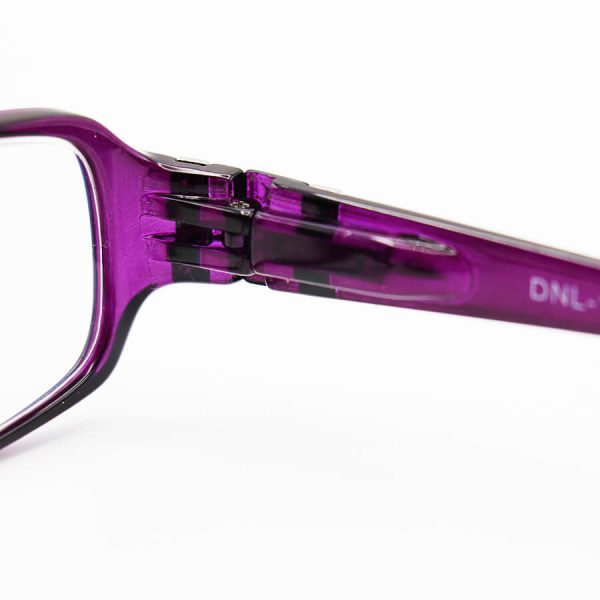 عکس از عینک مطالعه نزدیک بین با فریم بنفش رنگ نگین دار، از جنس کائوچو و لنز آنتی رفلکس مدل dnl-1609