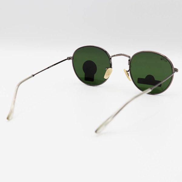 عکس از عینک آفتابی گرد ری بن با فریم فلزی، رنگ نوک مدادی، عدسی سنگ و سبز تیره مدل 3447