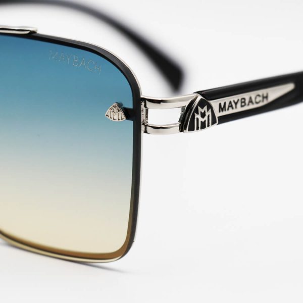 عکس از عینک آفتابی maybach با فریم نقره ای، شکل چندضلعی و لنز دو رنگ سایه روشن مدل 22384