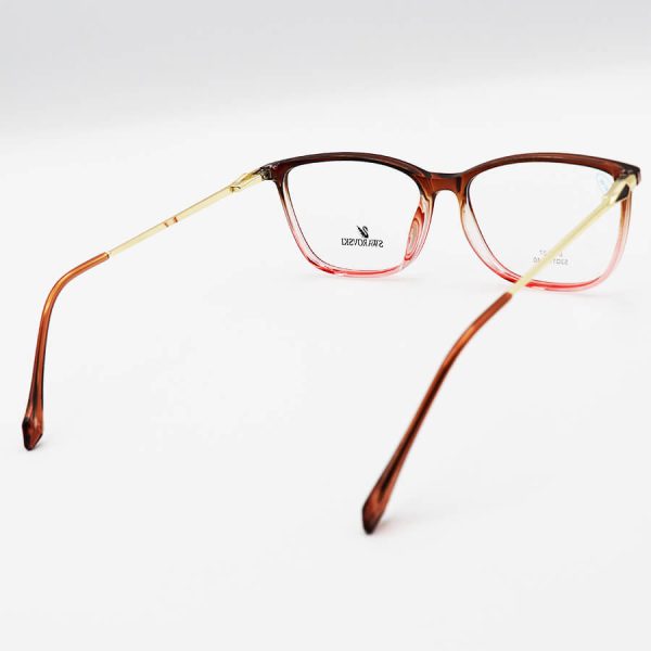 عکس از عینک طبی مستطیلی شکل با فریم دو رنگ، دسته طلایی و فنری swarovski مدل dt1827