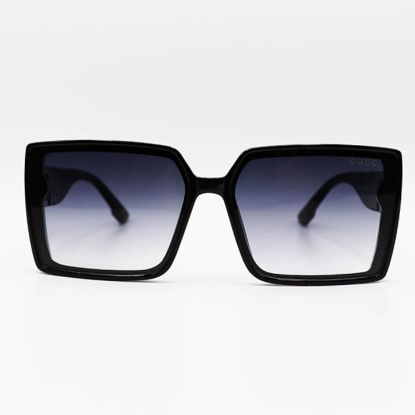 عکس از عینک آفتابی مربعی gucci با فریم مشکی رنگ، از جنس کائوچو و لنز دودی هایلایت مدل 3374