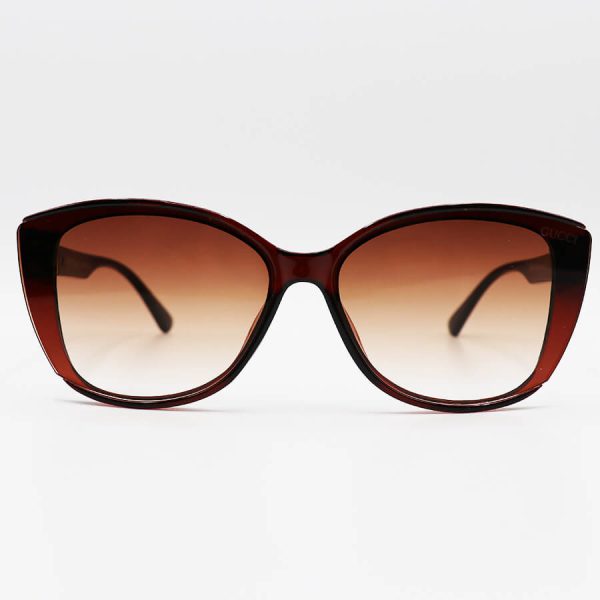 عکس از عینک آفتابی زنانه گوچی با فریم قهوه ای رنگ، گربه ای شکل و لنز قهوه ای هایلایت مدل m9060