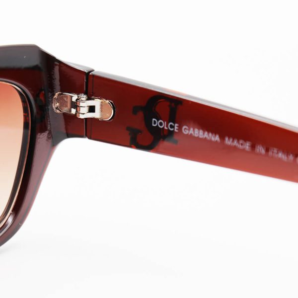 عکس از عینک آفتابی با فریم قهوه ای رنگ، بیضی شکل و لنز قهوه ای سایه روشن dolce & gabbana مدل 6087