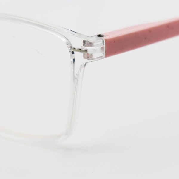 عکس از عینک مطالعه نزدیک بین با فریم مستطیلی شکل، بی رنگ و دسته صورتی کم رنگ مدل 3205