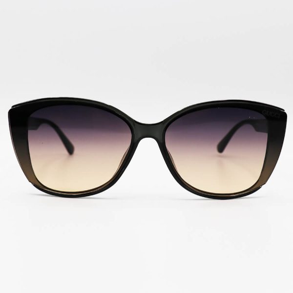 عکس از عینک آفتابی زنانه گوچی با فریم طوسی رنگ، گربه ای شکل و عدسی سایه روشن مدل m9060
