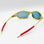 عکس از عینک آفتابی OAKLEY با فریم طلایی رنگ، لنز آینه ای و قرمز رنگ (سایز بزرگ) مدل W2236