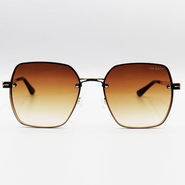 عکس از عینک آفتابی زنانه ic! Berlin با فریم تیتانیوم، طلایی رنگ، مربعی شکل و لنز قهوه ای هایلایت مدل 6609