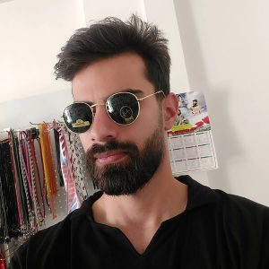عکس از عینک آفتابی گرد ریبن با فریم فلزی و عدسی شیشه ای مدل 3447 بر روی صورت محمدحیسن ابراهیم زاده