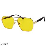 عکس از عینک شب پورشه دیزاین با فریم خلبانی، طلایی رنگ، دسته فنری و لنز زرد رنگ مدل DS2440S