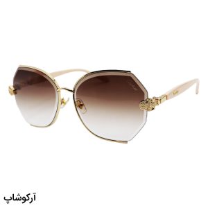 عکس از عینک آفتابی زنانه کارتیه با فریم طلایی رنگ، دسته کرمی و لنز قهوه ای سایه روشن مدل 2538