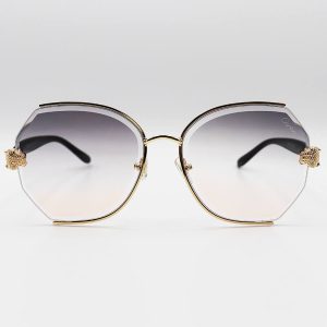 عکس از عینک آفتابی زنانه Cartier با فریم طلایی، دسته مشکی و عدسی دو رنگ سایه روشن مدل 2538