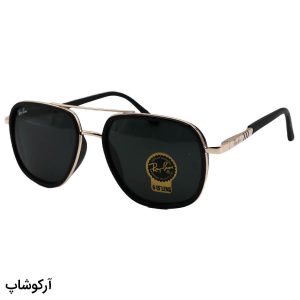 عکس از عینک آفتابی ریبن با فریم چندضلعی، طلایی رنگ، دسته فنردار و لنز سنگ و دودی تیره مدل RB3118