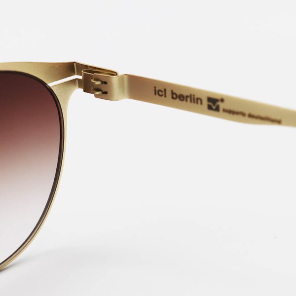 عکس از عینک آفتابی آیس برلین با فریم گرد، طلایی رنگ، از جنس تیتانیوم و لنز قهوه ای سایه روشن مدل ps18037