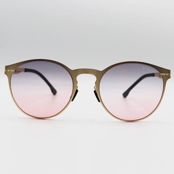 عکس از عینک آفتابی با عدسی دو رنگ، فریم گرد، از جنس تیتانیوم و طلایی رنگ برند ic! Berlin مدل ps18037