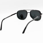 عکس از عینک آفتابی Ray-Ban با فریم هندسی، مشکی و خاکستری، دسته فنری و لنز شیشه و دودی مدل RB3118
