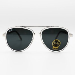 عکس از عینک آفتابی خلبانی Ray-Ban با فریم نقره ای رنگ، دسته فنری و لنز شیشه ای و دودی تیره مدل RB3115-1